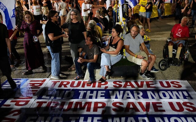 People attend a rally calling for the release of all hostages held by Hamas in the Gaza Strip and a ceasefire, in Tel Aviv, Israel, October 4, 2025. (AP Photo/Ohad Zwigenberg)