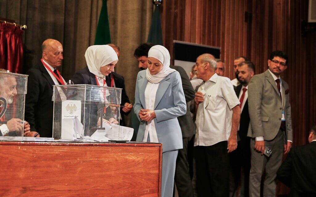 Syrian electoral college members line up to cast their ballots in a parliamentary election at a polling station in Damascus, on October 5, 2025. (AP/Omar Sanadiki) Syrian electoral college members line up to cast their ballots in a parliamentary election at a polling station in Damascus, on October 5, 2025. (AP/Omar Sanadiki)