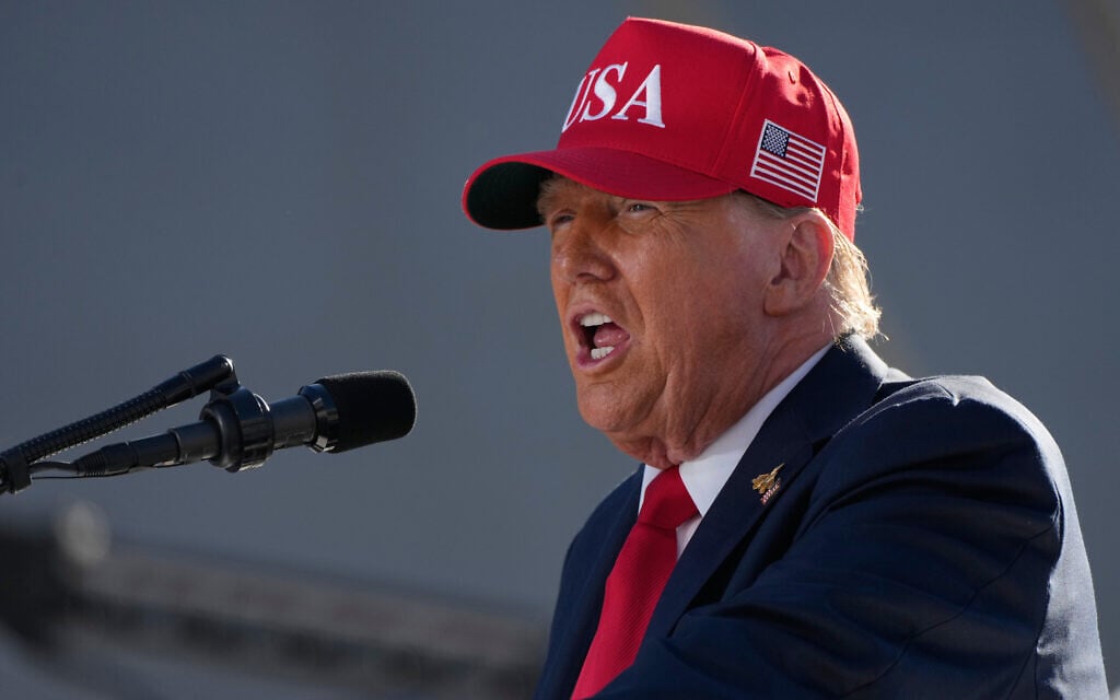 US President Donald Trump speaks during a celebration for the 250th anniversary of the US Navy aboard the USS Harry S. Truman at Naval Station Norfolk, October 5, 2025 in Norfolk, Virginia. (AP Photo/Alex Brandon)