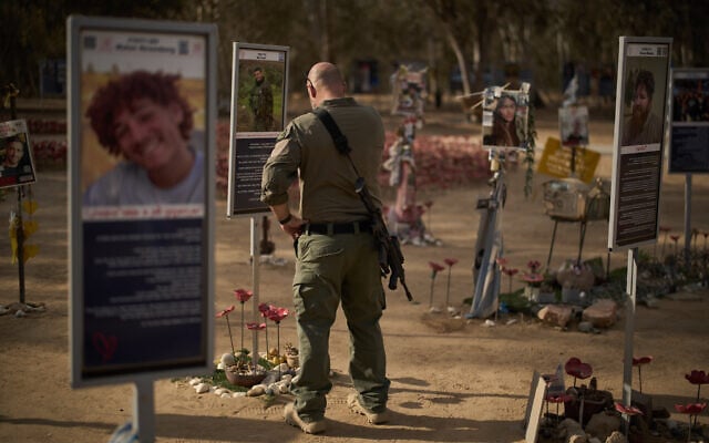 A soldier visits the site of the Nova music festival where revelers were killed and kidnapped during the October 7, 2023, Hamas-led attack. near Kibbutz Re'im in southern Israel, October 6, 2025. (AP Photo/Leo Correa)