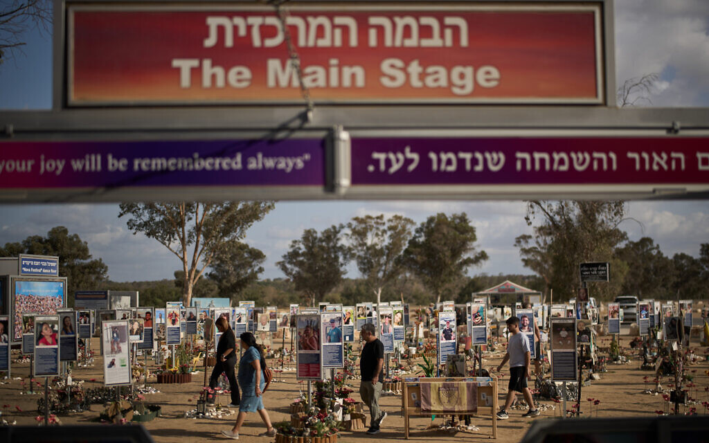 Relatives and friends visit the site where revelers were killed and kidnapped on Oct. 7, 2023 by Hamas terrorists at the Nova music festival, near the Kibbutz Reim, southern Israel, Monday, Oct. 6, 2025. (AP/Leo Correa)