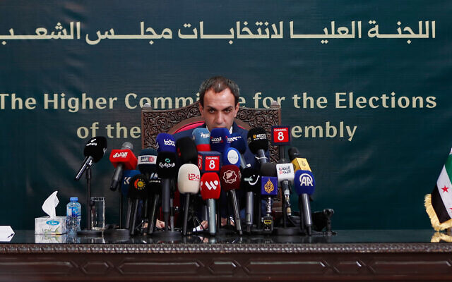 The spokesman for the Supreme Committee for the Syrian parliamentary elections, Nawwar Nejmeh, announces results of Syria's first parliamentary elections since the ouster of former president Bashar al-Assad during a press conference in Damascus, Syria, October 6, 2025. (AP Photo/Omar Sanadiki) The spokesman for the Supreme Committee for the Syrian parliamentary elections, Nawwar Nejmeh, announces results of Syria's first parliamentary elections since the ouster of former president Bashar al-Assad during a press conference in Damascus, Syria, October 6, 2025. (AP Photo/Omar Sanadiki)