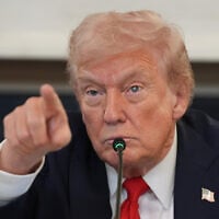 US President Donald Trump speaks during a roundtable meeting on "Antifa" in the State Dining Room at the White House, October 8, 2025, in Washington. (AP Photo/Evan Vucci)