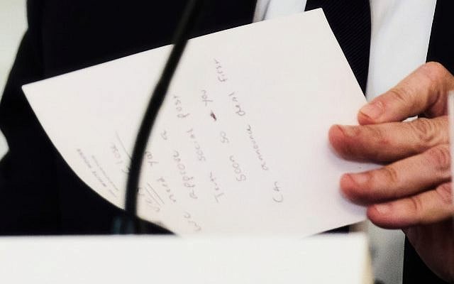 US Secretary of State Marco Rubio writes a note before handing it to President Donald Trump during a roundtable meeting in the State Dining Room at the White House, October 8, 2025, in Washington. (AP Photo/Evan Vucci) US Secretary of State Marco Rubio writes a note before handing it to President Donald Trump during a roundtable meeting in the State Dining Room at the White House, October 8, 2025, in Washington. (AP Photo/Evan Vucci)