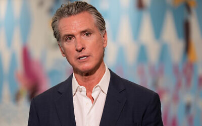 California Gov. Gavin Newsom speaks at a news conference at Belvedere Middle School, October 8, 2025, in Los Angeles. (AP Photo/Damian Dovarganes)