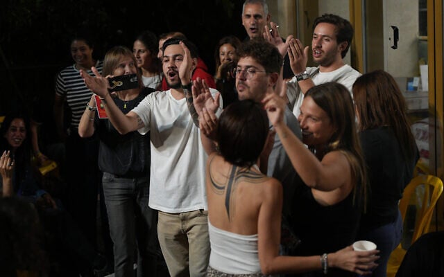 Former hostages, relatives of hostages and supporters celebrate after the announcement that Israel and Hamas have agreed to the first phase of US President Donald Trump's Gaza peace plan, in Hostages Square in Tel Aviv early on Thursday, Oct. 9, 2025. (AP Photo/Emilio Morenatti) Former hostages, relatives of hostages and supporters celebrate after the announcement that Israel and Hamas have agreed to the first phase of US President Donald Trump's Gaza peace plan, in Hostages Square in Tel Aviv early on Thursday, Oct. 9, 2025. (AP Photo/Emilio Morenatti)