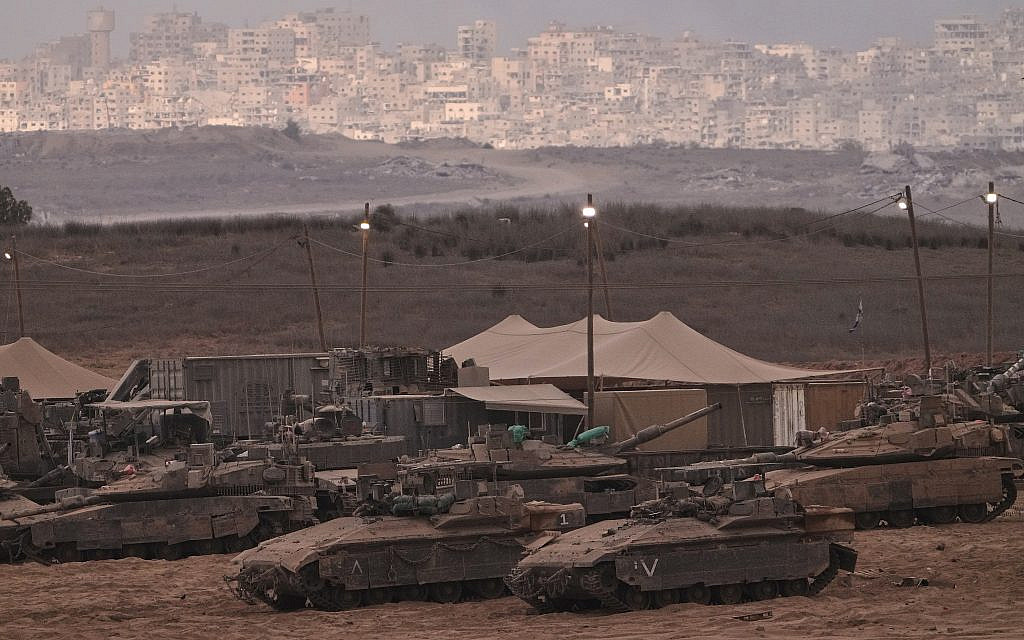 Israeli tanks are parked in a staging area near the Israeli-Gaza border, as seen from southern Israel, Thursday, Oct. 9, 2025. (AP/Ariel Schalit) Israeli tanks are parked in a staging area near the Israeli-Gaza border, as seen from southern Israel, Thursday, Oct. 9, 2025. (AP/Ariel Schalit)