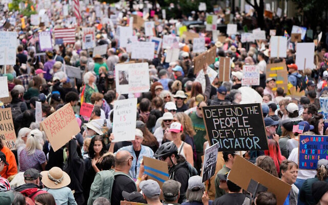 Demonstrators take part in a 'No Kings' protest in Portland, Oregon, June 14, 2025. (AP Photo/Jenny Kane) Demonstrators take part in a 'No Kings' protest in Portland, Oregon, June 14, 2025. (AP Photo/Jenny Kane)