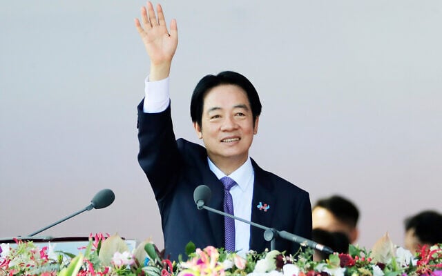 Taiwanese President Lai Ching-te waves during National Day celebrations in front of the Presidential Building in Taipei, Taiwan, on October 10, 2025. (AP Photo/Chiang Ying-ying) Taiwanese President Lai Ching-te waves during National Day celebrations in front of the Presidential Building in Taipei, Taiwan, on October 10, 2025. (AP Photo/Chiang Ying-ying)
