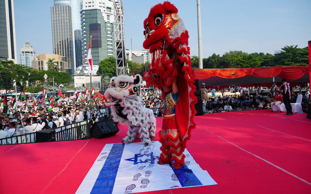 Lion dancers perform on an Israeli flag during a rally in solidarity of the Palestinians in Gaza, in Jakarta, Indonesia, October 12, 2025. (AP/Tatan Syuflana) Lion dancers perform on an Israeli flag during a rally in solidarity of the Palestinians in Gaza, in Jakarta, Indonesia, October 12, 2025. (AP/Tatan Syuflana)
