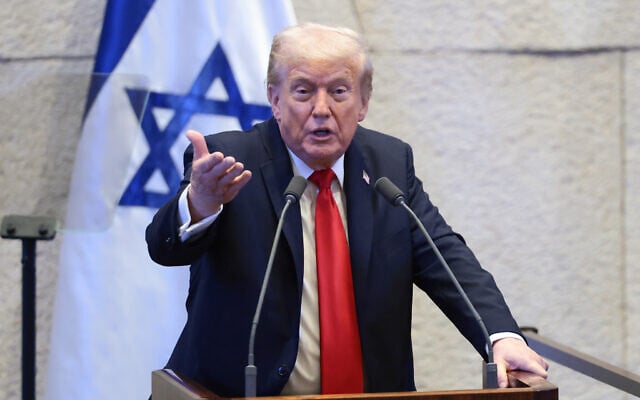 US President Donald Trump addresses the Knesset, October 13, 2025, in Jerusalem.  (Evelyn Hockstein/Pool via AP)