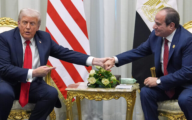 US President Donald Trump meets with Egypt's President Abdel-Fattah el-Sissi during a summit to support ending the more than two-year Israel-Hamas war in Gaza after a breakthrough ceasefire deal, Monday, Oct. 13, 2025, in Sharm El Sheikh, Egypt. (AP Photo/Evan Vucci)