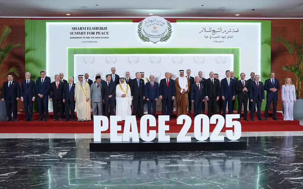 US President Donald Trump and other world leaders pose for a photo during a summit to support ending the two-year Israel-Hamas war in Gaza after a breakthrough ceasefire deal, Monday, Oct. 13, 2025, in Sharm El Sheikh, Egypt. (AP Photo/Evan Vucci, Pool)