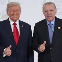 US President Donald Trump greets Turkey's President Recep Tayyip Erdogan during a summit to support ending the more than two-year Israel-Hamas war in Gaza after a breakthrough ceasefire deal, October 13, 2025, in Sharm El Sheikh, Egypt. (AP Photo/Evan Vucci, Pool)