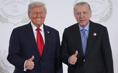 US President Donald Trump (left) greets Turkey's President Recep Tayyip Erdogan during a summit to support ending the more than two-year Israel-Hamas war in Gaza after a breakthrough ceasefire deal, October 13, 2025, in Sharm El Sheikh, Egypt. (AP/Evan Vucci, Pool)