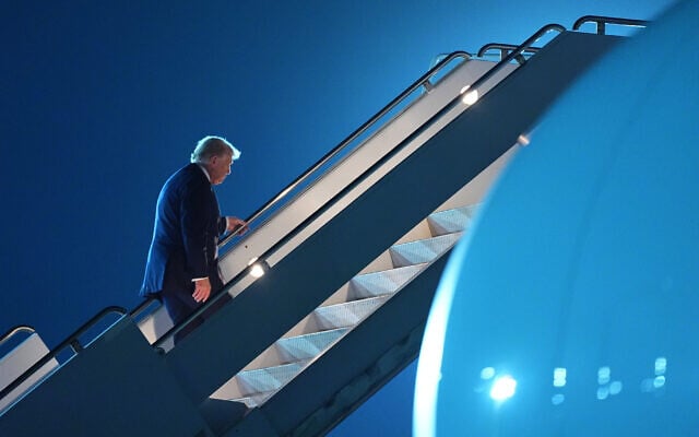President Donald Trump boards Air Force One at Sharm el-Sheikh International Airport, Monday, Oct. 13, 2025, in Sharm El Sheikh, Egypt, to return to Washington. (AP Photo/Evan Vucci)