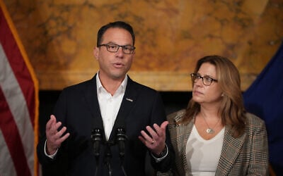 Pennsylvania Gov. Josh Shapiro, accompanied by his wife Lori Shapiro, speaks during a news conference after Cody Balmer, who set fire to Shapiro's residence, pled guilty to attempted murder and other charges, on Tuesday, October 14, 2025 in Harrisburg, Pennsylvania. (AP Photo/Matt Slocum) Pennsylvania Gov. Josh Shapiro, accompanied by his wife Lori Shapiro, speaks during a news conference after Cody Balmer, who set fire to Shapiro's residence, pled guilty to attempted murder and other charges, on Tuesday, October 14, 2025 in Harrisburg, Pennsylvania. (AP Photo/Matt Slocum)