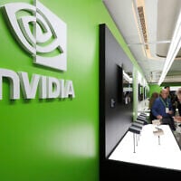 People take a look at Nvidia''s new products during the Computex 2025 exhibition in Taipei, Taiwan, Wednesday, May 21, 2025. (AP Photo/Chiang Ying-ying, File)