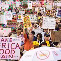 Crowds gather to listen to Sen. Bernie Sanders, an Independent of Vermont, during a No Kings protest, in Washington, October 18, 2025. (Allison Robbert/AP)