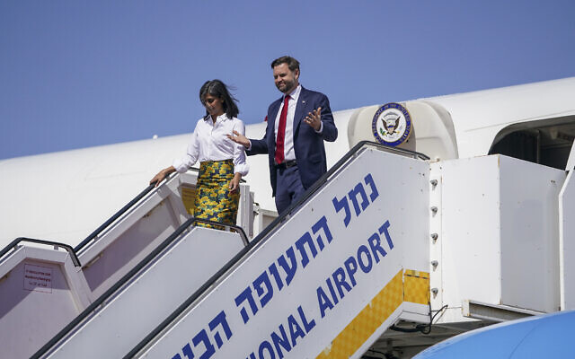 Vice President J.D. Vance, right, and Second Lady Usha Vance arrive at Ben Gurion Airport in Tel Aviv, Oct. 21, 2025. (Nathan Howard/Pool Photo via AP)