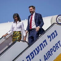 US Vice President JD Vance, right, and Second Lady Usha Vance arrive at Ben Gurion airport in Tel Aviv, Israel, Monday, Oct. 21, 2025. (Nathan Howard/Pool Photo via AP)