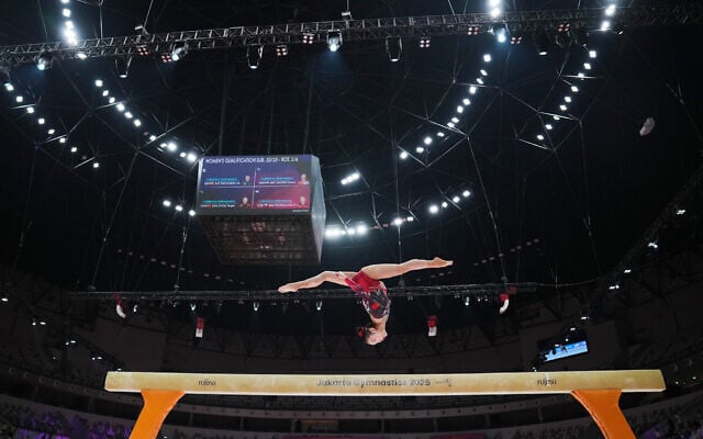Zhou Yaqin of China competes on the balance beam during the 53rd Artistic Gymnastics World Championships in Jakarta, Indonesia, October 21, 2025. (Dita Alangkara/AP)