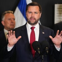 US Vice President JD Vance speak to the media as US Special Envoy to the Middle East Steve Witkoff and Jared Kushner stand next to him, in Kiryat Gat, Israel, October 21, 2025. (AP Photo/Francisco Seco)