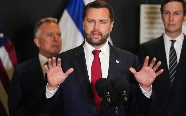 US Vice President JD Vance speak to the media as US Special Envoy to the Middle East Steve Witkoff and Jared Kushner stand next to him, in Kiryat Gat, Israel, October 21, 2025. (AP Photo/Francisco Seco)