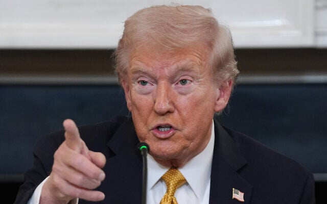 US President Donald Trump answers questions from reporters during a roundtable on criminal cartels in the State Dining Room of the White House, October 23, 2025, in Washington. (AP/Evan Vucci) US President Donald Trump answers questions from reporters during a roundtable on criminal cartels in the State Dining Room of the White House, October 23, 2025, in Washington. (AP/Evan Vucci)