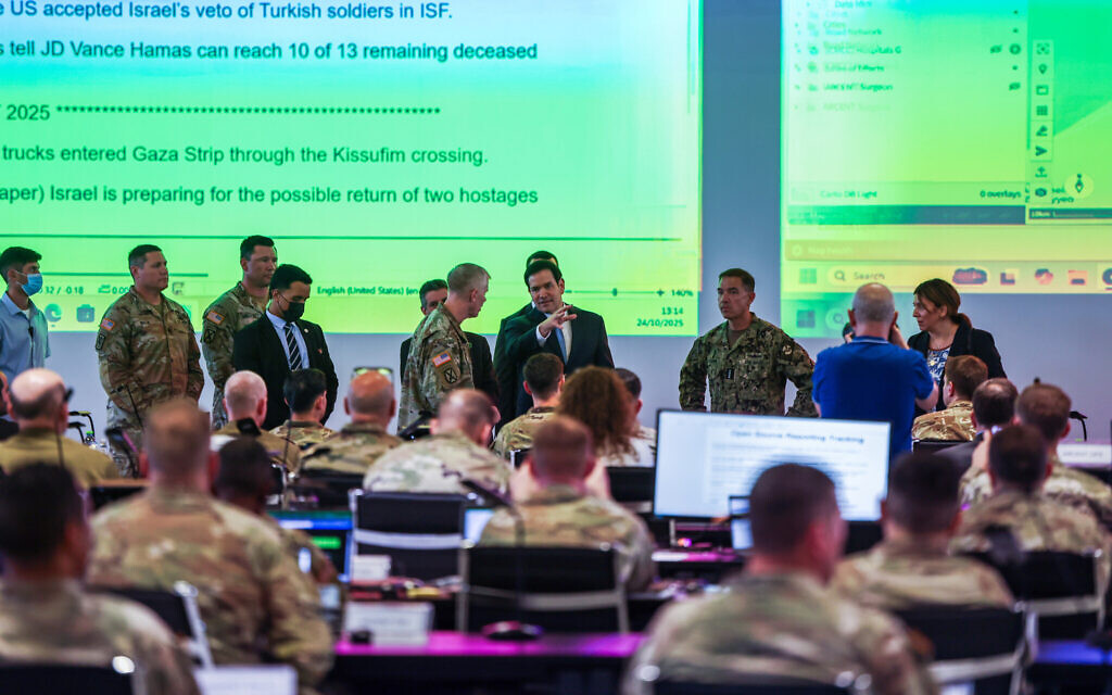 US Secretary of State Marco Rubio speaks with US military personnel as he visits the Civil-Military Coordination Center in southern Israel, October 24, 2025. (Fadel Senna/Pool Photo via AP)