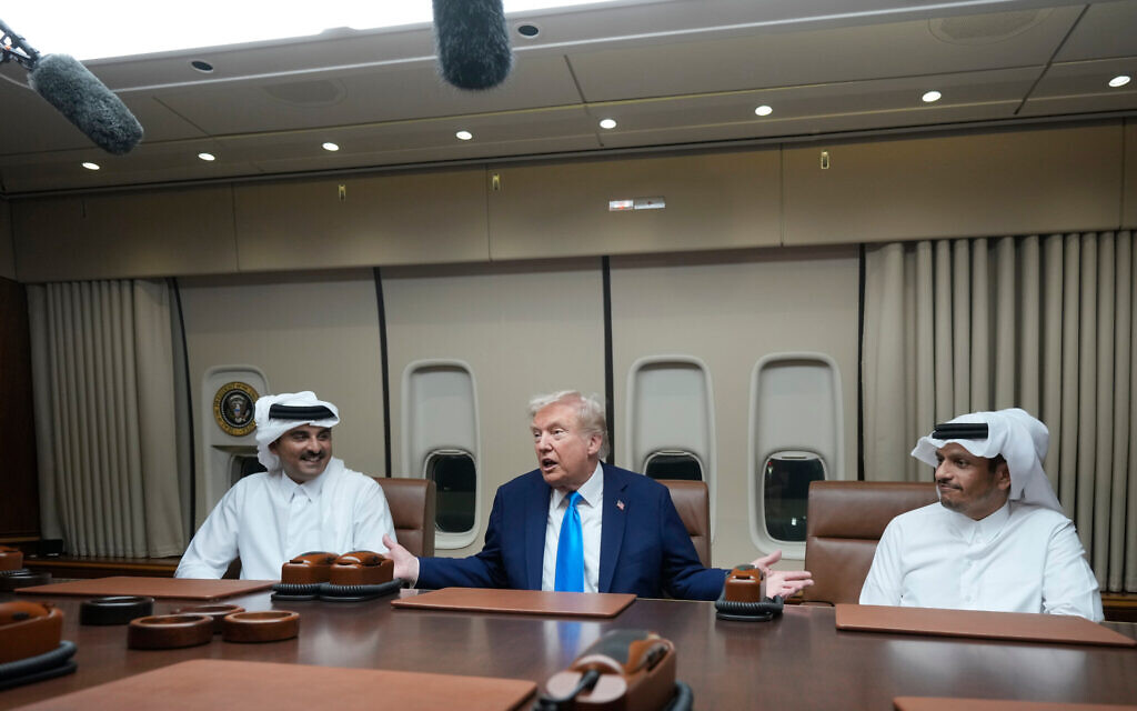 US President Donald Trump, center, meets with Emir of Qatar Sheikh Tamim bin Hamad al-Thani, left, and Qatar Prime Minister and Foreign Minister Sheikh Mohammed bin Abdulrahman bin Jassim Al Thani aboard Air Force One at Al Udeid Air Base in Doha, Qatar, October 25, 2025. (AP Photo/Mark Schiefelbein) US President Donald Trump, center, meets with Emir of Qatar Sheikh Tamim bin Hamad al-Thani, left, and Qatar Prime Minister and Foreign Minister Sheikh Mohammed bin Abdulrahman bin Jassim Al Thani aboard Air Force One at Al Udeid Air Base in Doha, Qatar, October 25, 2025. (AP Photo/Mark Schiefelbein)