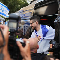 Freed Israeli hostage Evyatar David, who was recently released from Hamas captivity in Gaza, is welcomed home as he returns from the hospital to Kfar Saba, Oct. 26, 2025. (AP/Ariel Schalit)