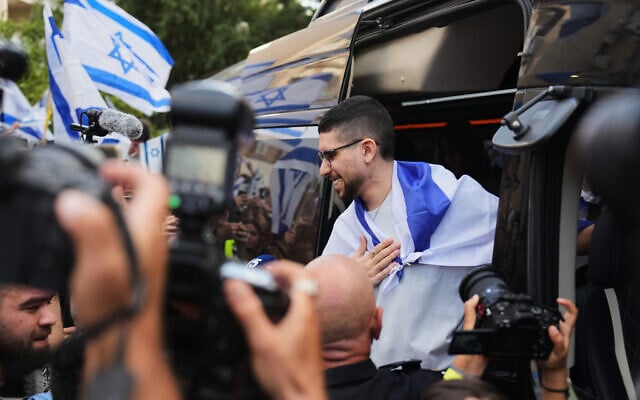 Freed Israeli hostage Evyatar David, who was recently released from Hamas captivity in Gaza, is welcomed home as he returns from the hospital to Kfar Saba, Oct. 26, 2025. (AP/Ariel Schalit)