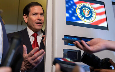 US Secretary of State Marco Rubio speaks to reporters aboard Air Force One while traveling with President Donald Trump from Kuala Lumpur, Malaysia, to Tokyo, Japan, October 27, 2025. (AP Photo/Mark Schiefelbein) US Secretary of State Marco Rubio speaks to reporters aboard Air Force One while traveling with President Donald Trump from Kuala Lumpur, Malaysia, to Tokyo, Japan, October 27, 2025. (AP Photo/Mark Schiefelbein)
