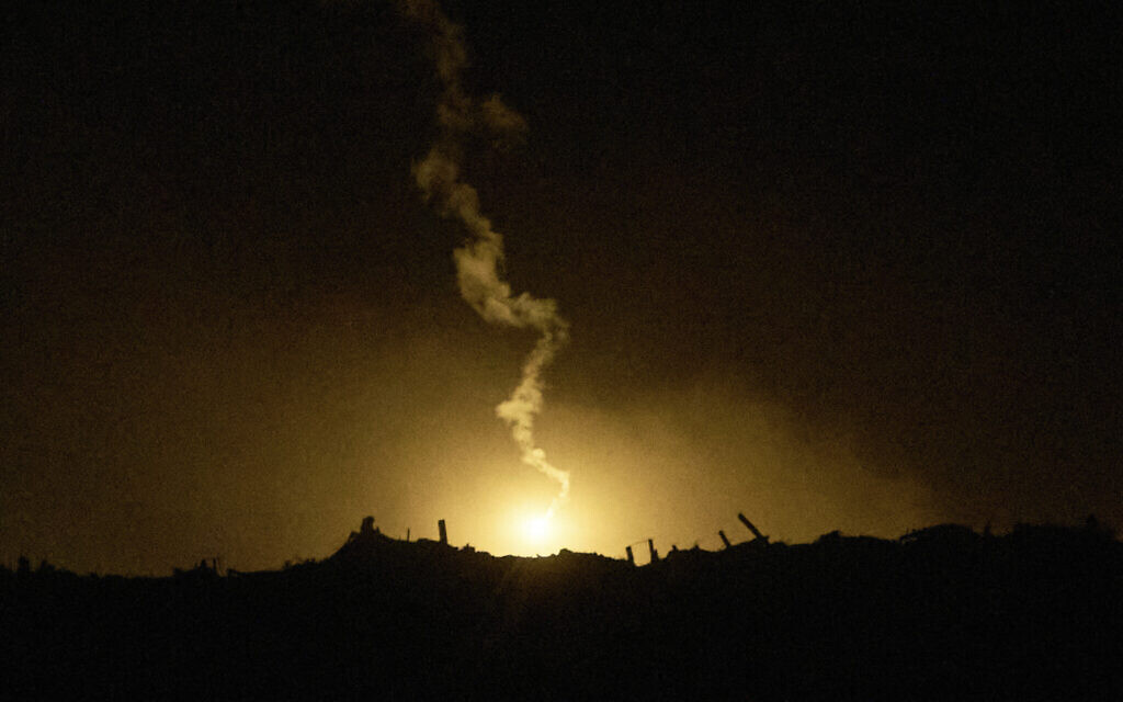 An Israeli army flare drifts over an area in the northern Gaza Strip, as seen from southern Israel, October 28, 2025. (AP Photo/Leo Correa)