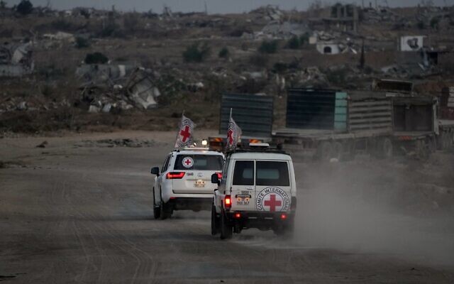 Red Cross vehicles carrying the bodies of two people believed to be deceased hostages handed over by Hamas make their way toward the Kissufim border crossing with Israel, to be transferred to Israeli authorities, in Deir al-Balah, central Gaza Strip, October 30, 2025. (AP Photo/Abdel Kareem Hana) Red Cross vehicles carrying the bodies of two people believed to be deceased hostages handed over by Hamas make their way toward the Kissufim border crossing with Israel, to be transferred to Israeli authorities, in Deir al-Balah, central Gaza Strip, October 30, 2025. (AP Photo/Abdel Kareem Hana)