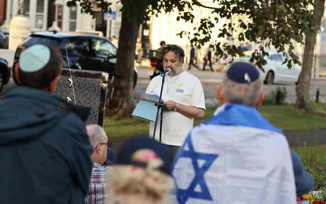 Adam Ma'anit speaks during an event at the October 7 memorial in Brighton, United Kingdom, in this undated photo. (Sussex News/ R. James)