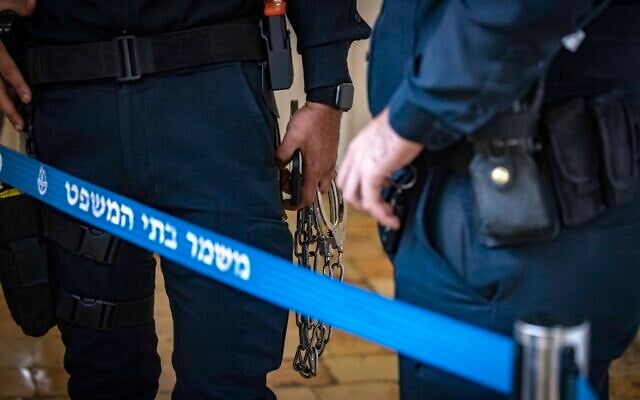 Photo illustration of handcuffs in a Jerusalem court on November 21, 2022. (Olivier Fitoussi/Flash90)
