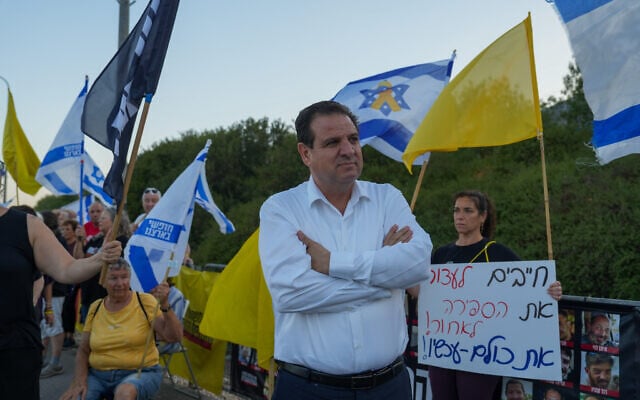Hadash-Ta'al chair Ayman Odeh attends a protest against the Israeli government and for the release of Israelis held hostage in the Gaza Strip, at the Goma junction, northern Israel, on August 30, 2025. (Ayal Margolin/Flash90)