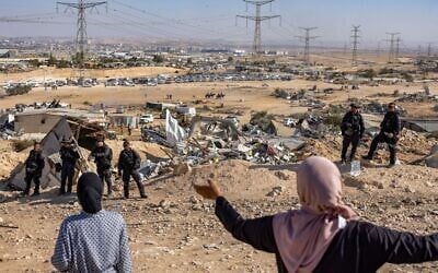 Israeli security forces demolish homes in an unrecognized Bedouin village in the Negev, September 17, 2025. (Flash90) Israeli security forces demolish homes in an unrecognized Bedouin village in the Negev, September 17, 2025. (Flash90)
