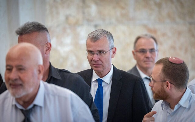 Justice Minister Yariv Levin arrives at the Supreme Court for the retirement ceremony for judge Yosef Elron, September 18, 2025. (Yonatan Sindel/Flash90)