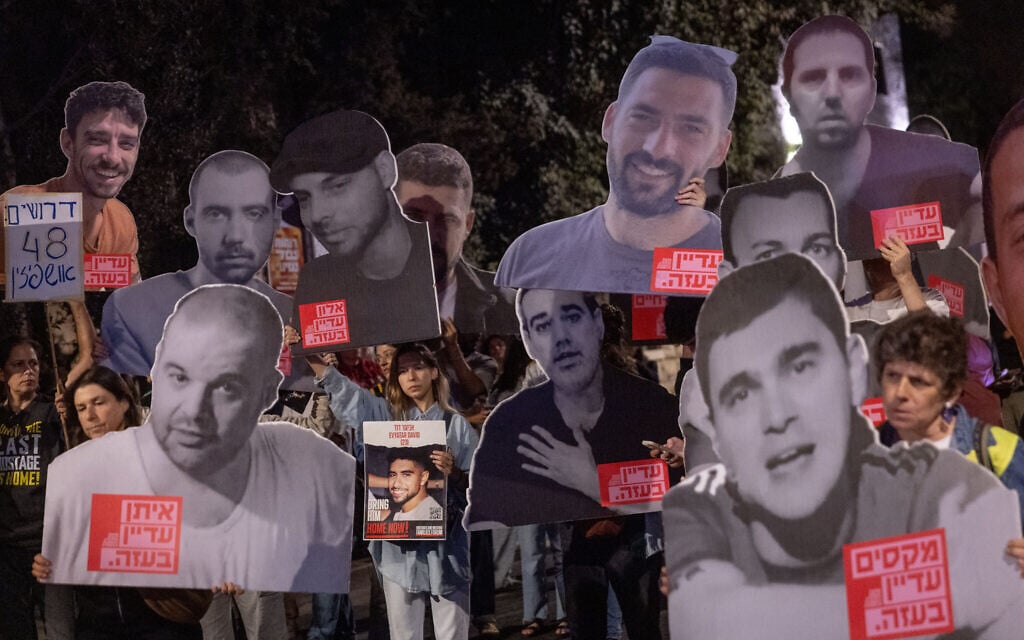 Israelis attend a protest calling for the release of the hostages held by Hamas in Gaza, and an end to the war, outside Prime Minister Benjamin Netanyahu's residence in Jerusalem, on October 5, 2025. (Chaim Goldberg/Flash90)