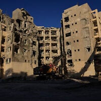 A high-rise residential building in Beersheba that was hit by an Iranian missile on the final day of the war in June, 2025, is demolished, on October 8, 2025. (Tsafrir Abayov/Flash90)