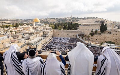 Jewish worshipers attend the 'priestly blessing' ceremony at Jerusalem's Western Wall during the Jewish holiday of Sukkot, on October 9, 2025. (Chaim Goldberg/Flash90) Jewish worshipers attend the 'priestly blessing' ceremony at Jerusalem's Western Wall during the Jewish holiday of Sukkot, on October 9, 2025. (Chaim Goldberg/Flash90)