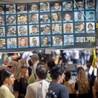 Visitors at Hostage Square in Tel Aviv on October 12, 2025. (Miriam Alster/FLASH90)