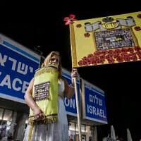 People demonstrate for the release of all hostages held in the Gaza Strip at Hostages Square in Tel Aviv, October 14, 2025. (Avshalom Sassoni/Flash90)