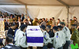 Family and friends of slain hostage Israeli soldier Captain Daniel Perez attend his funeral at the Mount Herzl Military Cemetery in Jerusalem on October 15, 2025. (Chaim Goldberg/Flash90)