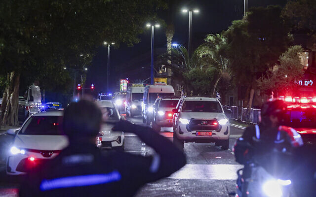 A convoy carrying the bodies of three hostages arrives at the Abu Kabir Forensic Institute in Tel Aviv, on October 15, 2025. (Jamal Awad/Flash90)