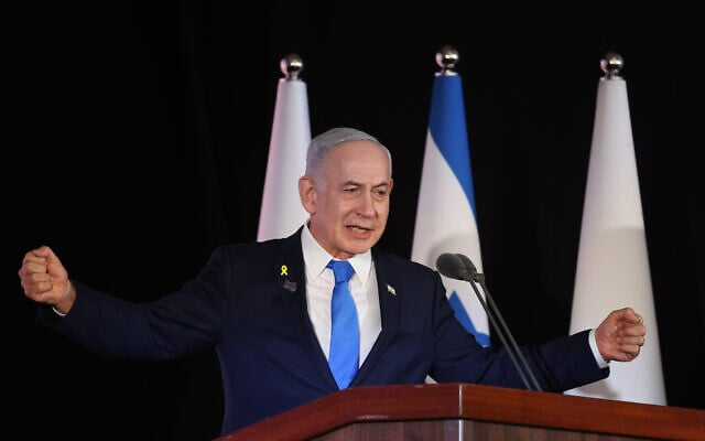 Prime Minister Benjamin Netanyahu speaks at a state ceremony marking the Hebrew calendar anniversary of the October 7, 2023, attacks, at the Mount Herzl military cemetery in Jerusalem, on October 16, 2025. (Alex Kolomoisky/POOL)