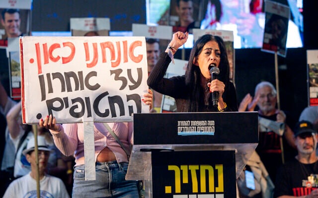 Einav Zangauker, mother of released hostage Matan Zangauker, speaks at a protest at Hostages Square in Tel Aviv calling for the release of captives' bodies held by Hamas, October 18, 2025. (Chaim Goldberg/Flash90)